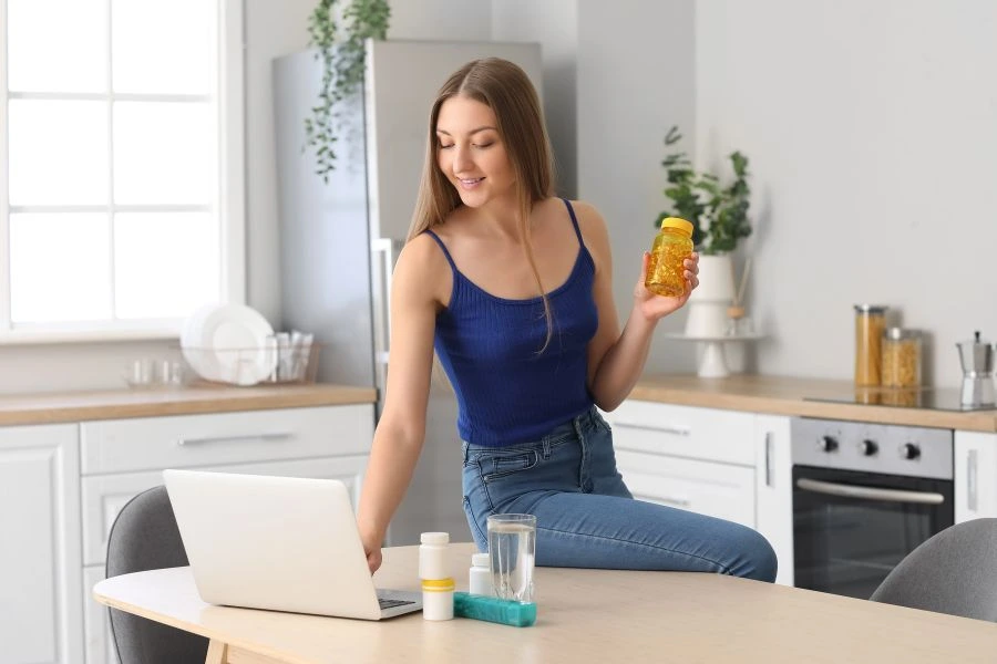 Woman researching beauty supplements